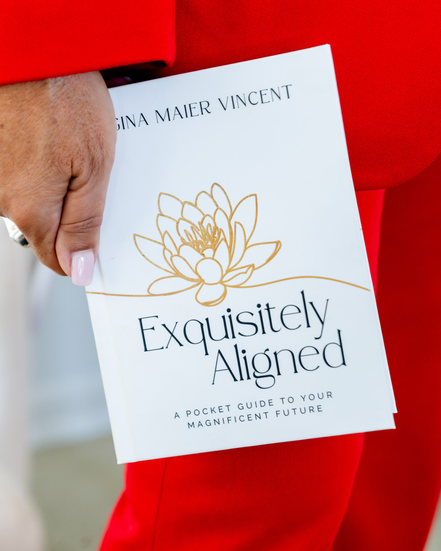 Gina Maier Vincent holding Exquisitely Aligned