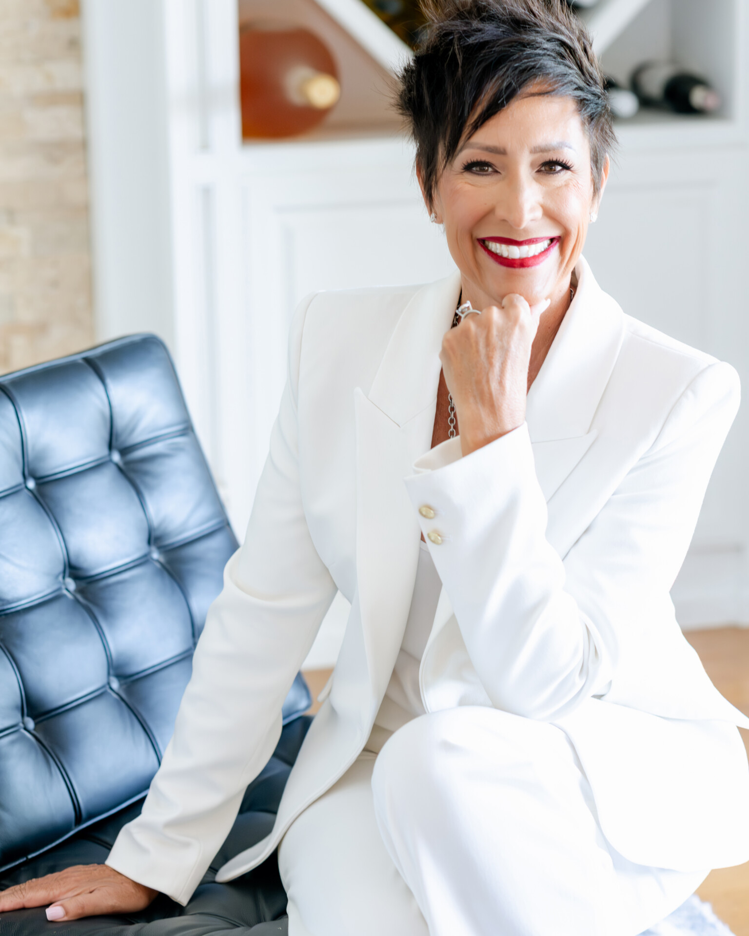 Gina Maier Vincent in a white suit